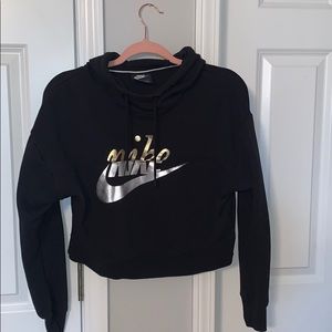 Black nike cropped sweatshirt.